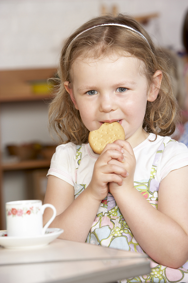 Young Girl Having Tea at Montessori/Pre-School