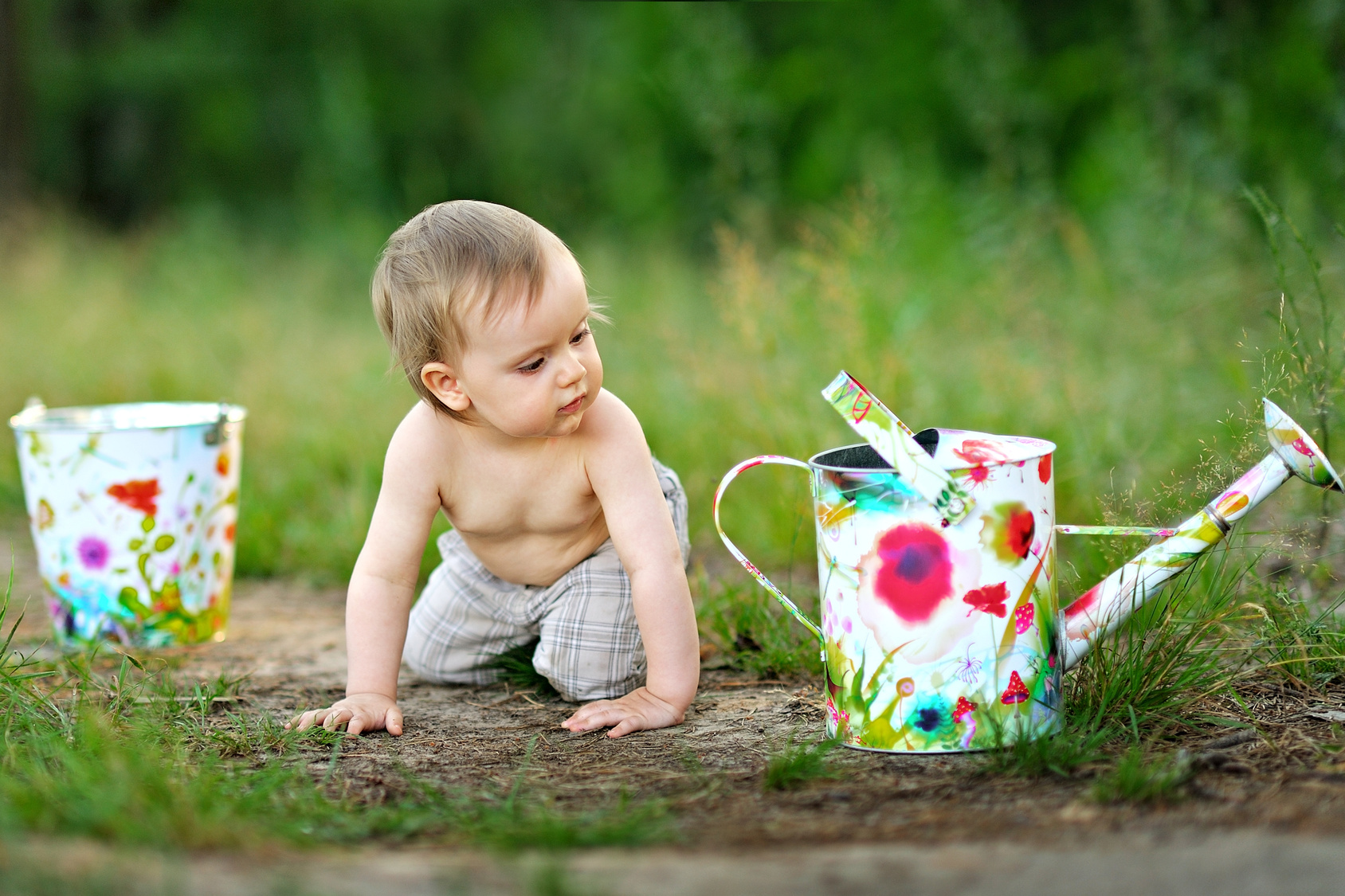 portrait of little boy outdoors in summer